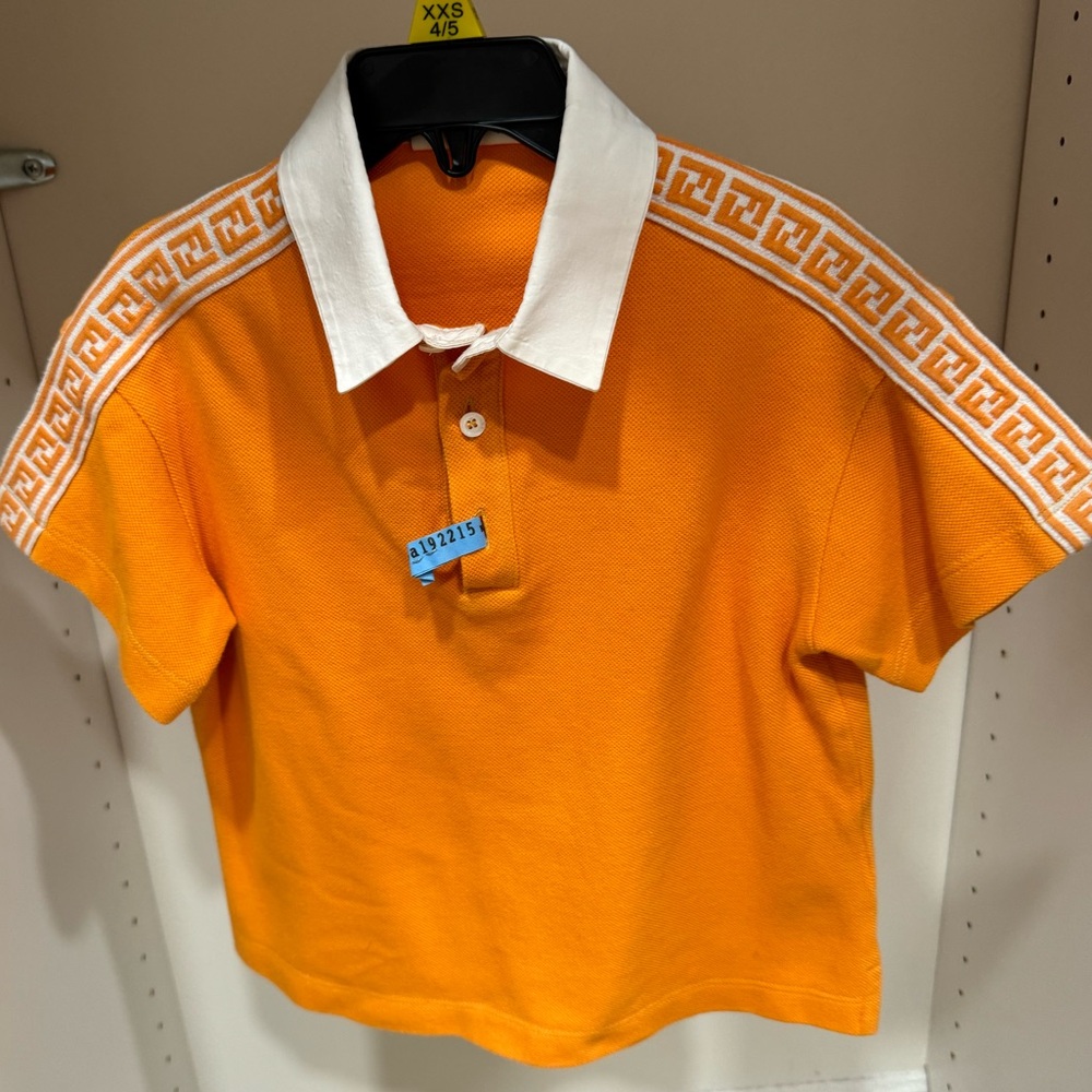 Fendi polo shirt for boys. Color is orange/yellow with white. Size is 4T.